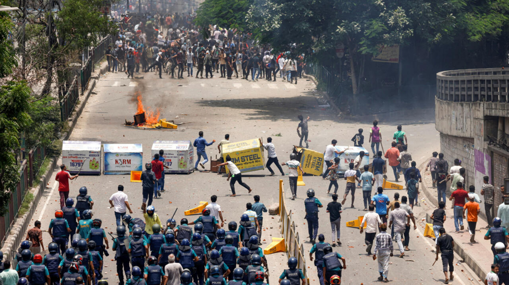 Gatherings banned in Bangladesh after government buildings burned, dozens killed