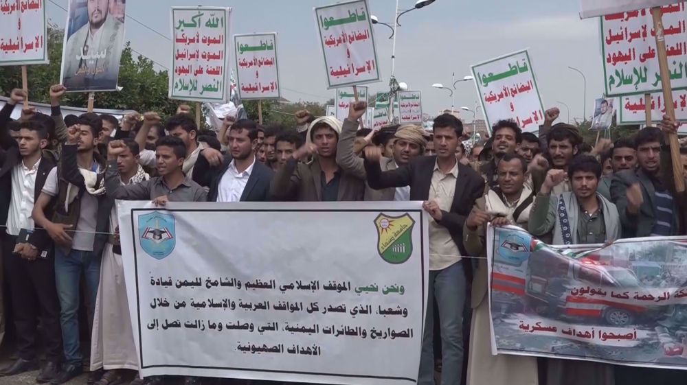 Sana'a university students stand with Gaza