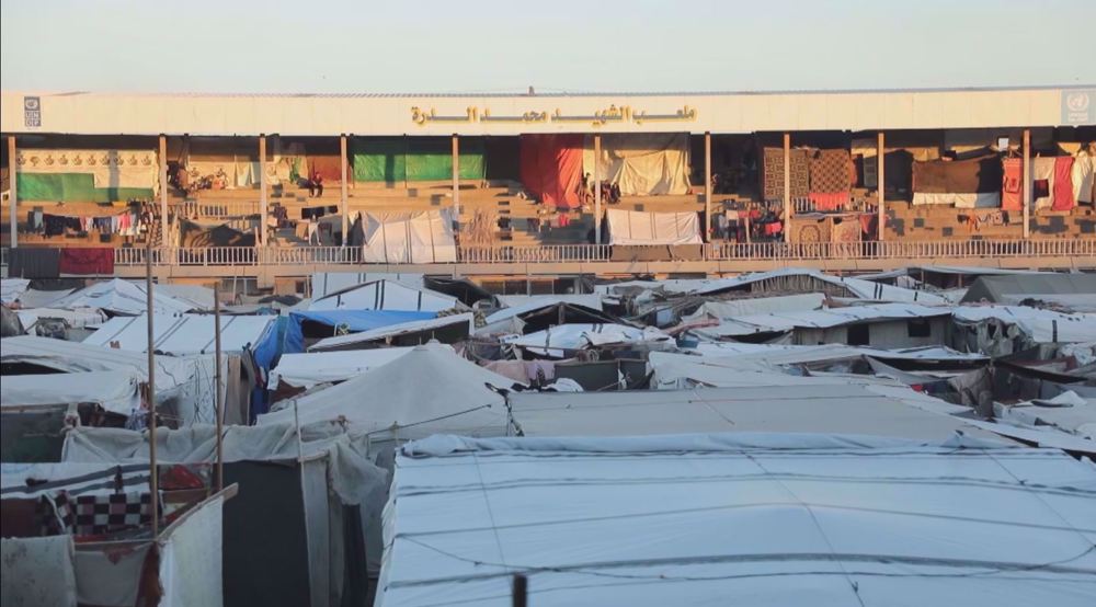 Displaced Palestinians taking refuge in stadium face lack of basic necessities