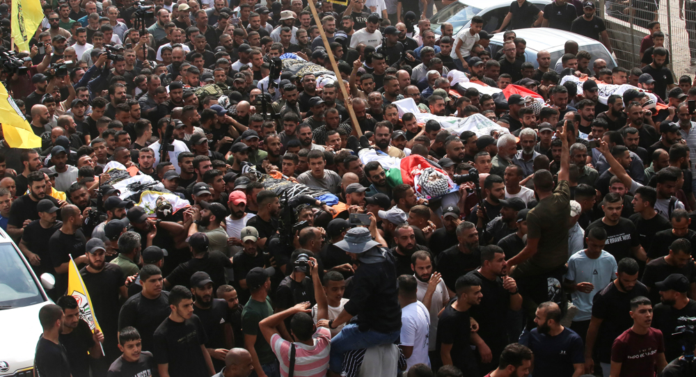 Thousands attend funeral of Palestinian fighters killed by Israeli forces in West Bank