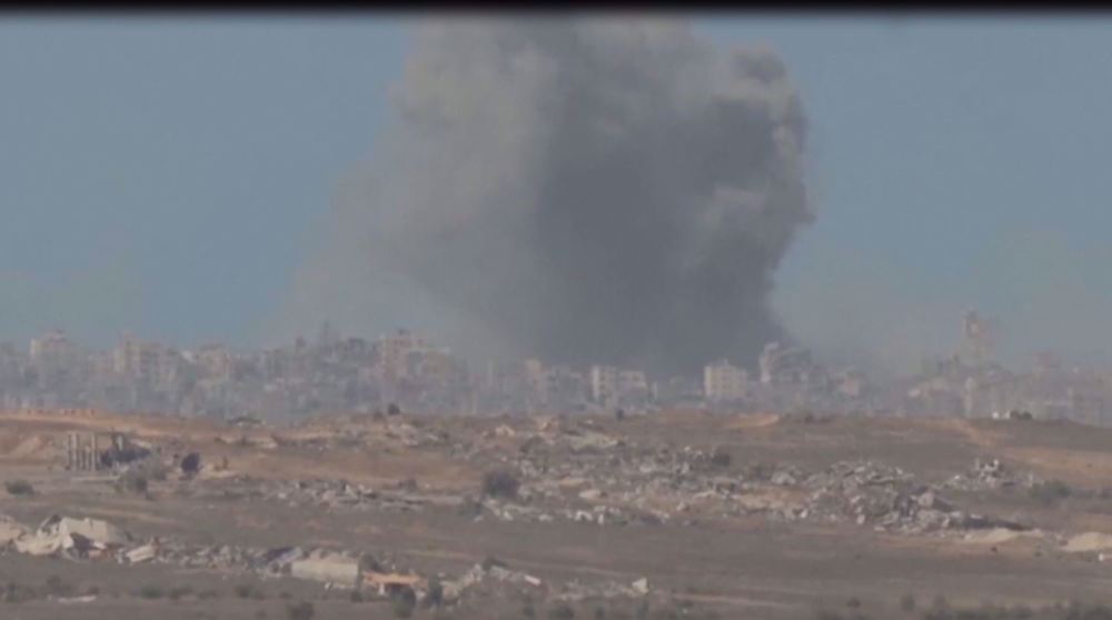 Smoke rises over Gaza ahead of talks between Hamas, Israel