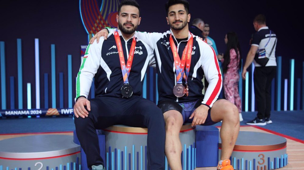 World Weightlifting Championships: Iranian duo win gold, silver in 94kg snatch  