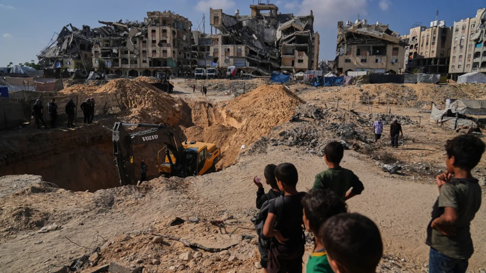 Israeli army razes Palestinian homes in Gaza, continues raids across West Bank
