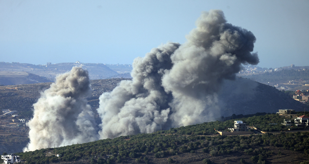 Israel's war minister threatens full-scale invasion of Lebanon 