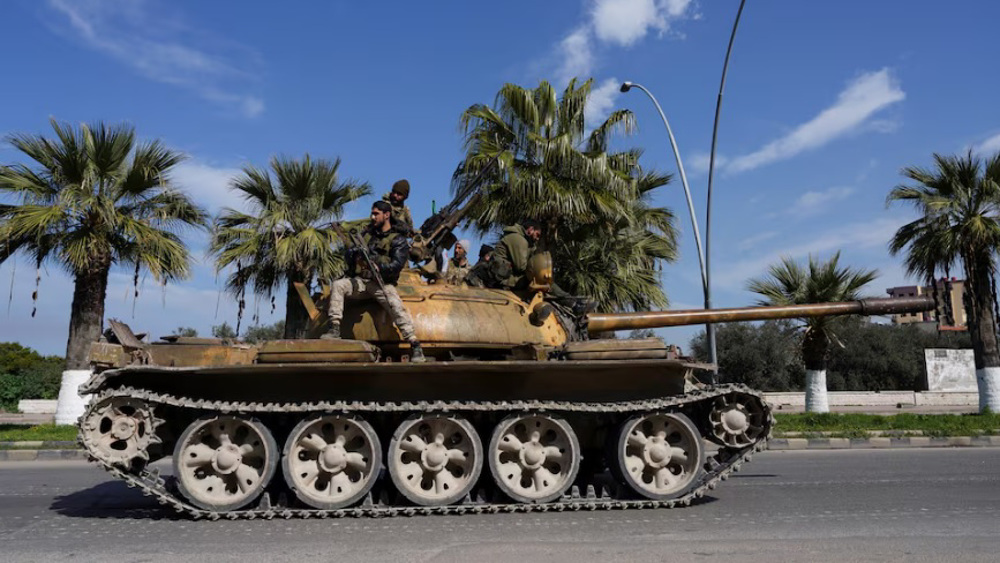 Gunmen kill 12 civilians in western, central Syria on 1st day of Eid al-Fitr