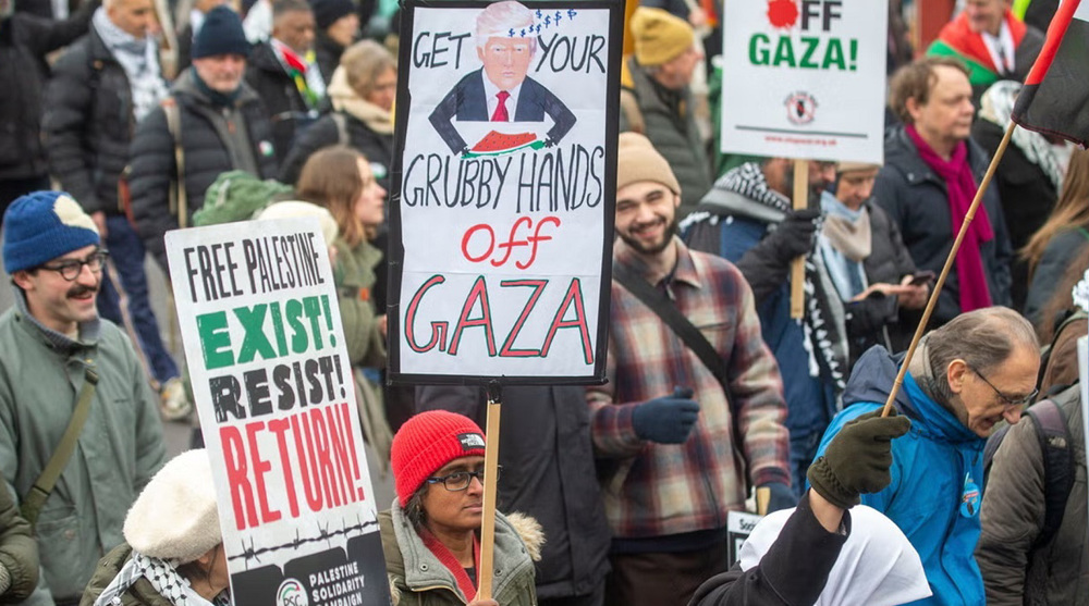 Protesters form human chain in front of US Embassy in London