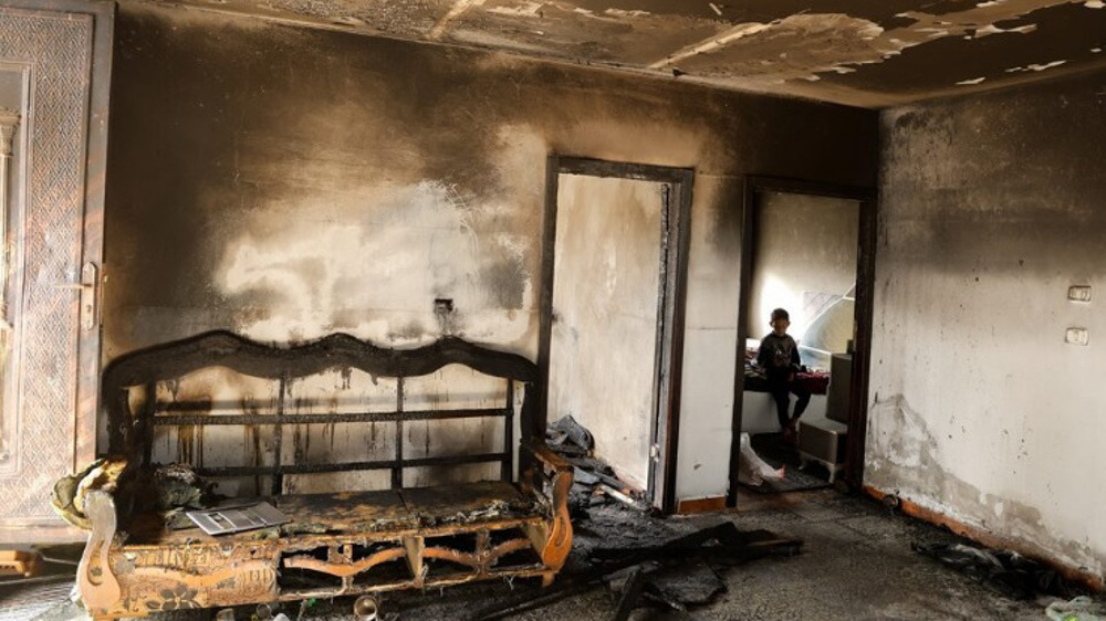 Armed Israeli settlers storm West Bank village, damage private property