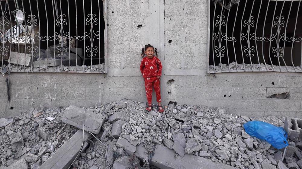 Nine children among dozens killed in Israeli strike on UN building in Gaza