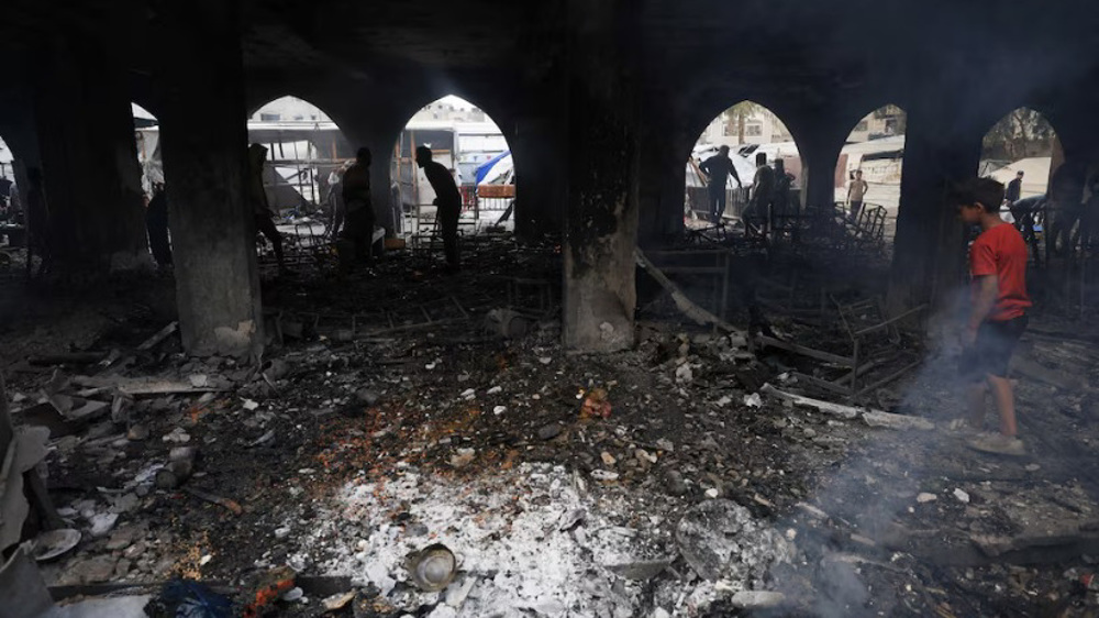 Charred bodies found in school as Israeli strikes kill dozens in Gaza