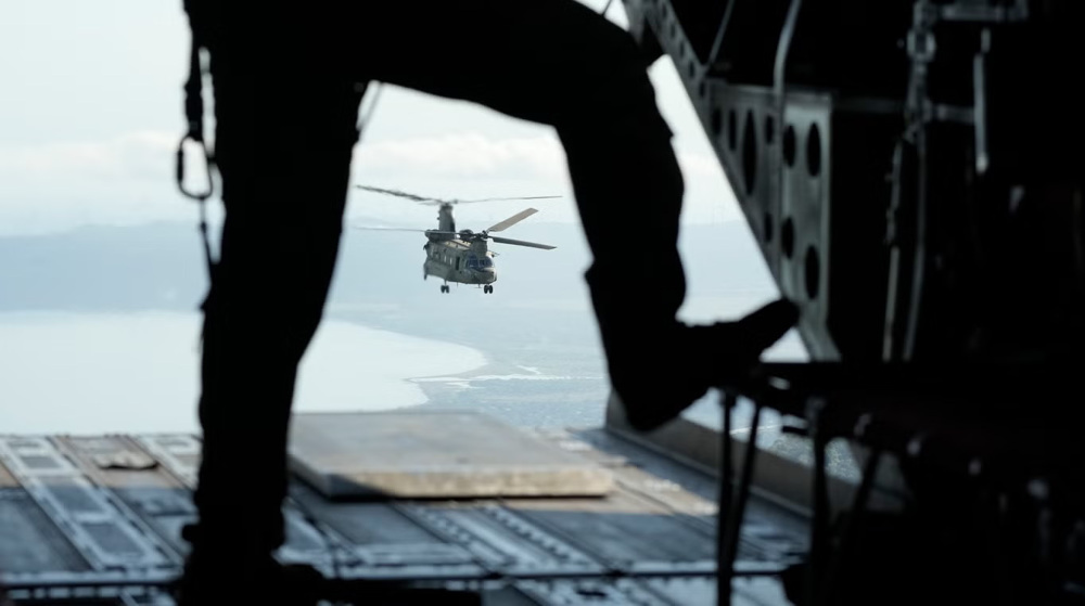 China deploys naval group in warning to US, Philippines over drills 