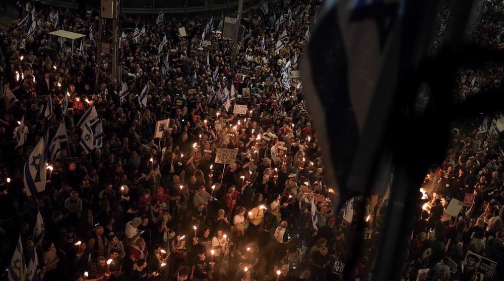 Israeli protesters condemn resumption of Gaza war