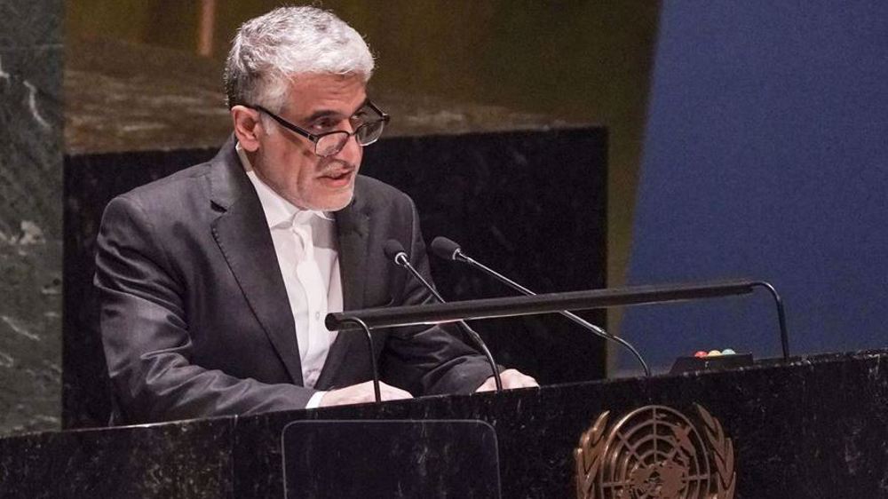 Iran says lifting of sanctions on Syria 'long overdue' but 'positive'