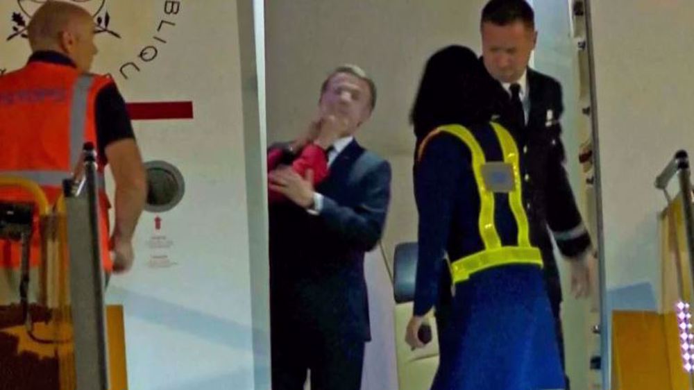 France's First Lady caught on video slapping Macron