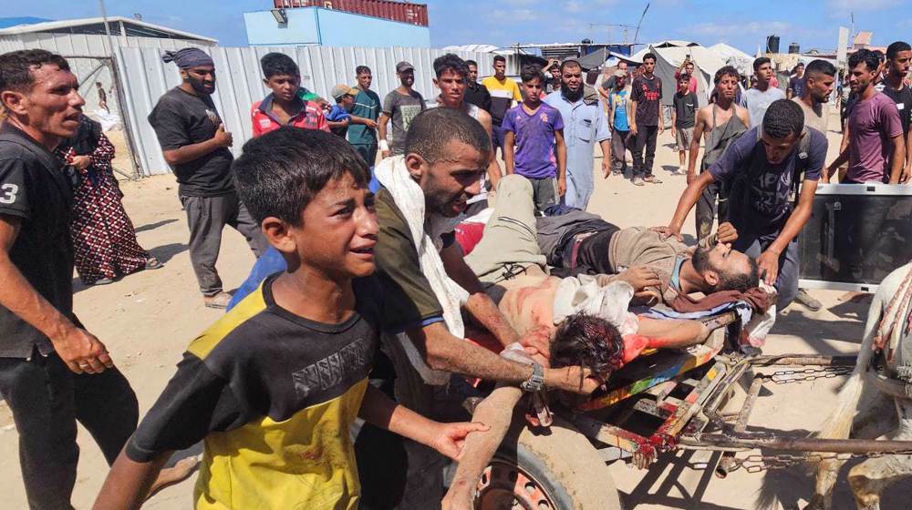 Israeli forces open fire on aid seekers in Rafah, killing at least 30 Palestinians 