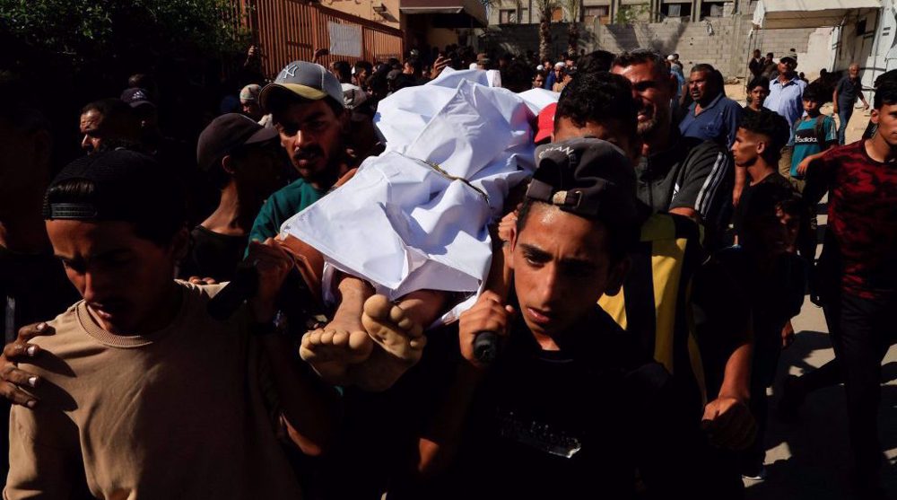 Israel kills dozens of Palestinians in raids on Gaza aid distribution points