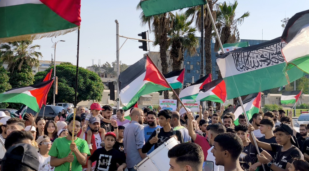 Syrians hold pro-Gaza march amid siege, silence