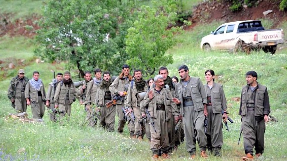 PKK in Iraq begins arms surrender after decades of conflict with Turkey