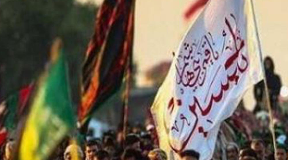 Pilgrims marching toward holy Iraqi city of Karbala to mark Arba’een