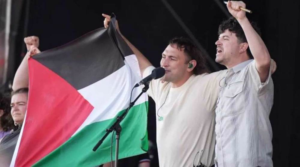 Bands boycott UK festival after Irish group 'cut off' for waving Palestinian flag