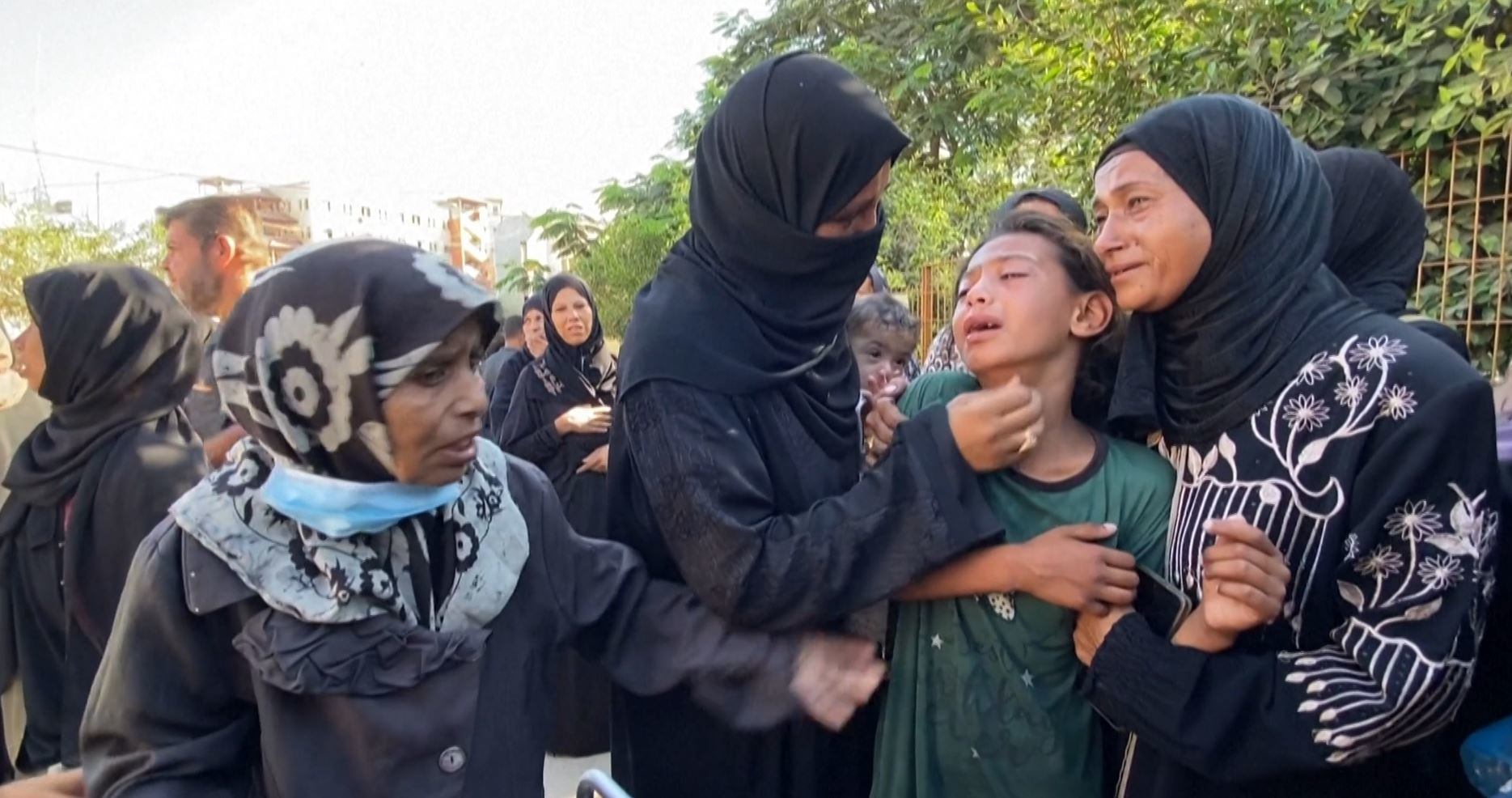 Palestinians mourn relatives killed while seeking aid in southern Gaza
