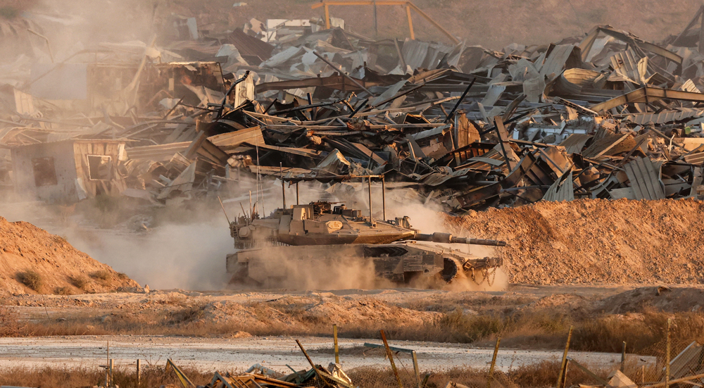 Gaza City under siege: Israeli forces kill dozens, set shelters ablaze