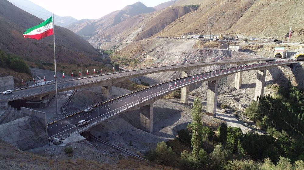 Iran opens another section of major road project connecting Tehran with north