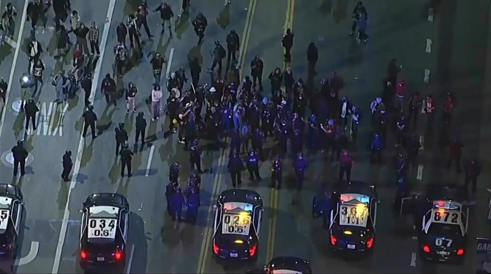Protest erupts in downtown Los Angeles over government killing of woman