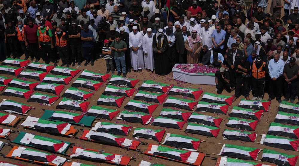 Palestinians hold mass funeral for 105 martyrs of US-Israeli genocide