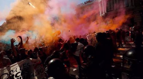 Riot police clash with protesters in Barcelona demanding action on affordable housing