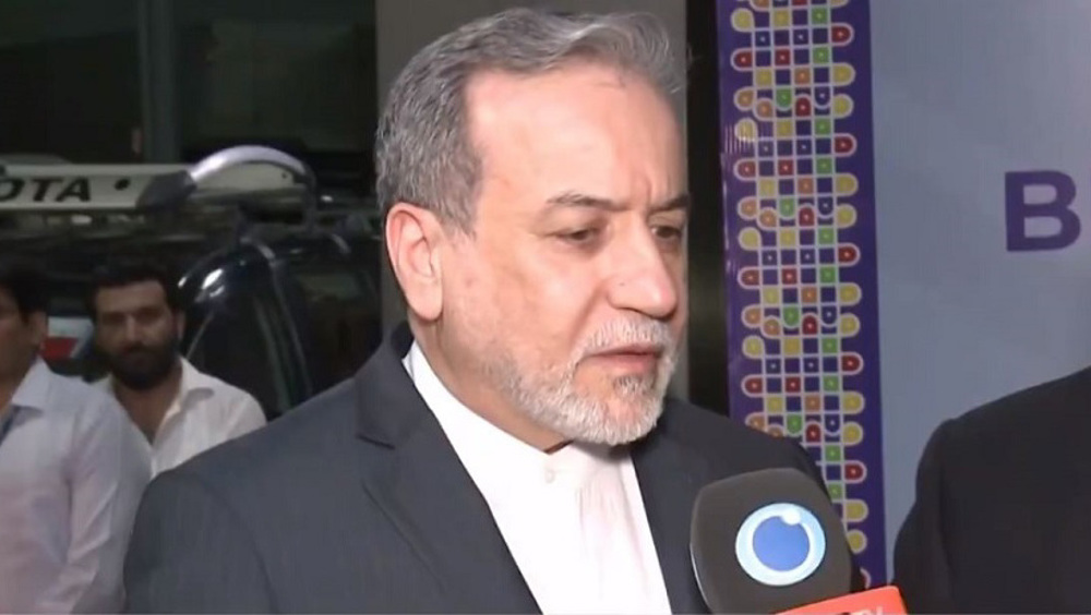 Iran FM says US strangling Hormuz through illegal blockade, Strait open to cooperative vessels 