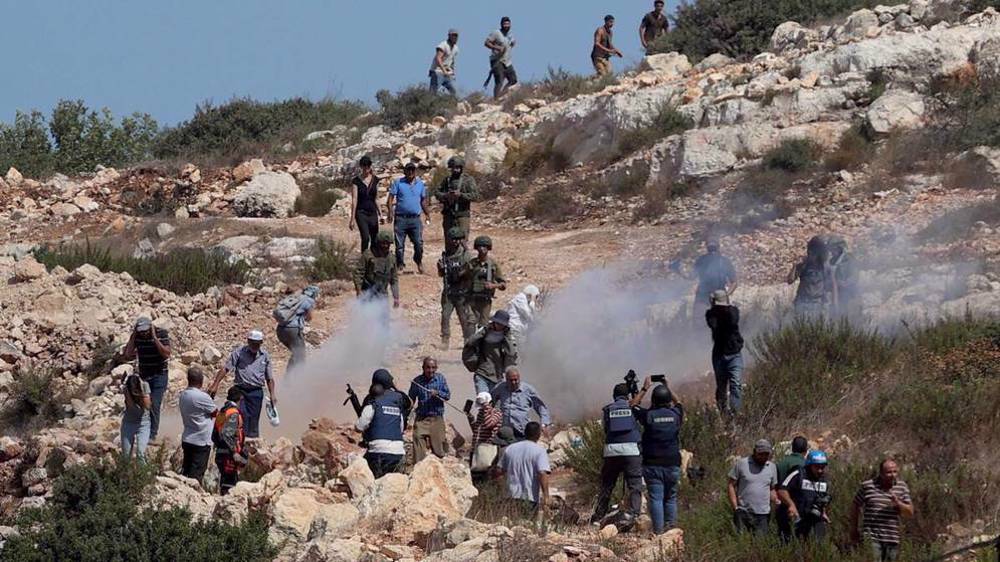 Israeli forces, settlers intensify attacks across occupied West Bank