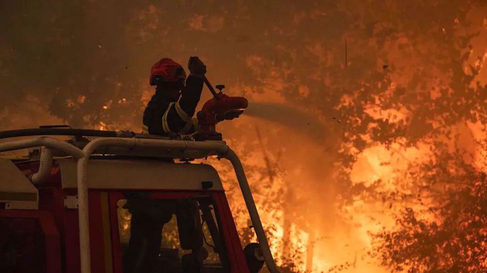 Wildfires leave a trail of destruction across North America and Europe
