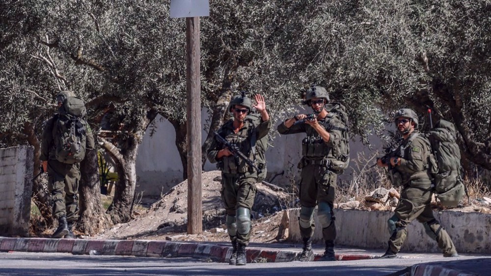 Masked Israeli settlers attack NBC News crew in occupied West Bank