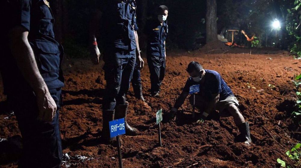 Nepal buries victims of Himalayan flooding as death toll climbs past 900