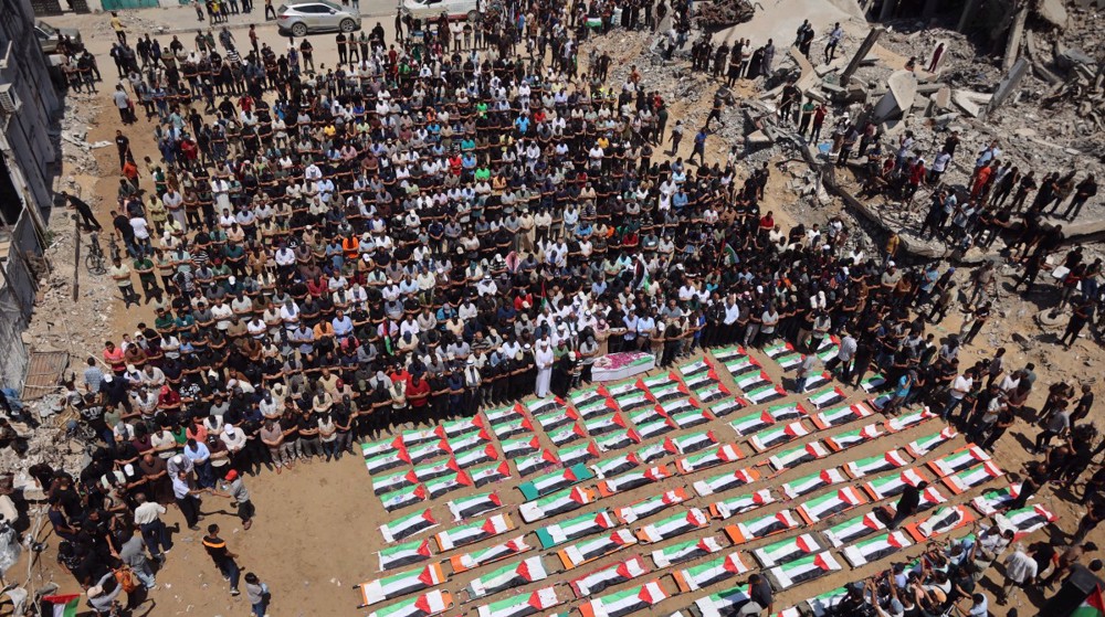 Palestinians mourn 112 bodies retrieved from debris in Gaza