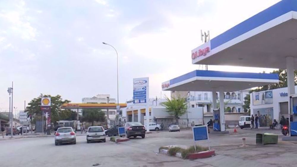 Tunisia fuel truck drivers go on strike over social rights