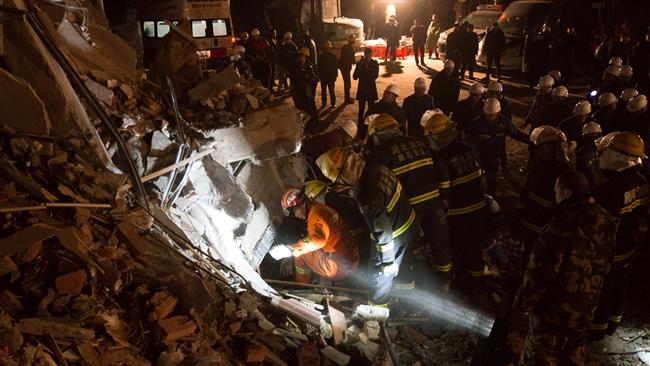 Two killed, 10 missing in central China landslide