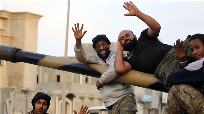 Libyan forces liberate key Benghazi district