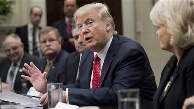 Appeals court holds hearing over Trump ban