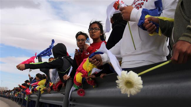 Mexicans form 'human wall' to protest Trump