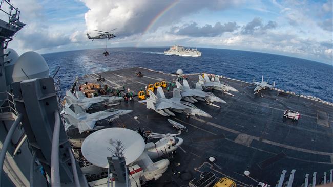 US strike group begins patrols in S China Sea 