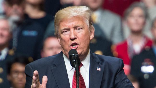 Trump blasts court ruling blocking travel ban