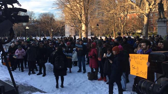 Protesters rally over Trump's revised travel ban
