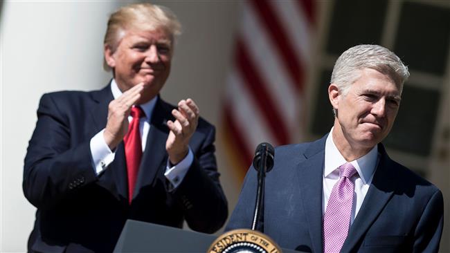 Gorsuch sworn in as Trump basks in victory