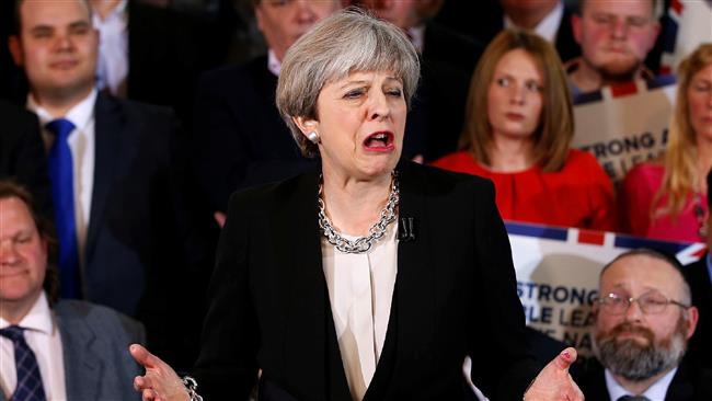 British MPs vote to back snap elections