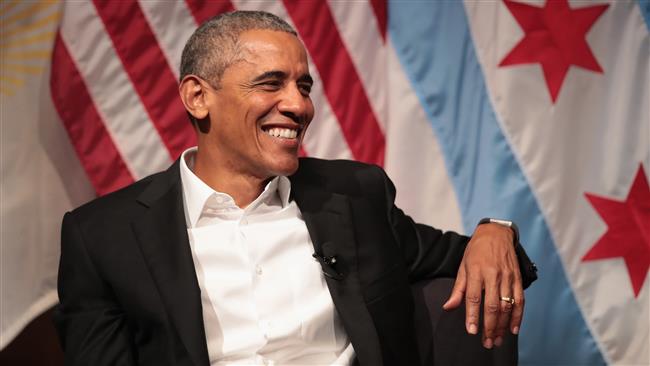Obama reappears, avoids Trump