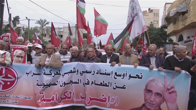 Gaza marches to honor Palestinian prisoners 