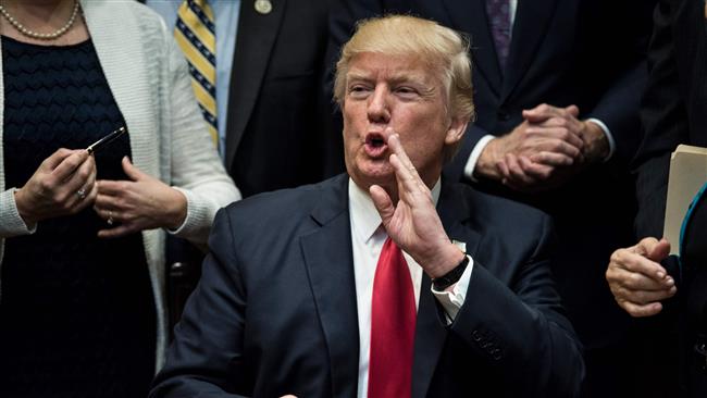 Trump under fire over huge tax cut for the rich