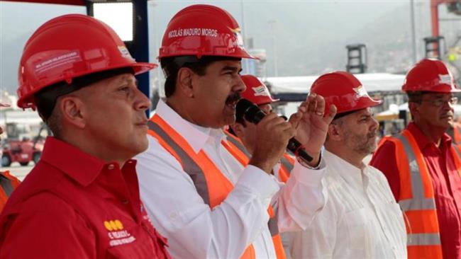 Venezuela hikes pay, gives away houses 