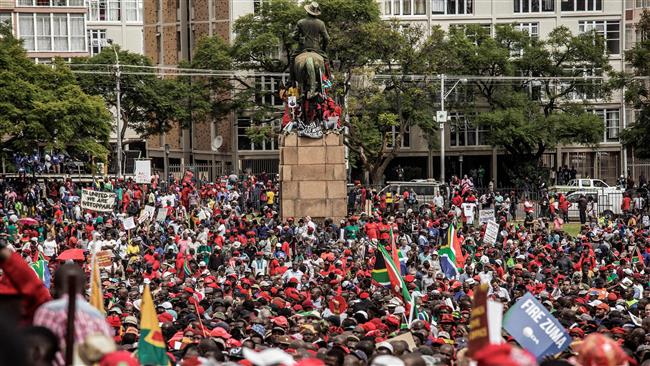 S Africa's Zuma leaves rally after boos from crowd